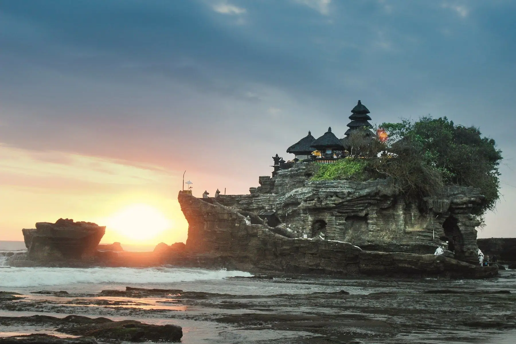Tanah Lot sea temple on its rocky outcrop at sunset