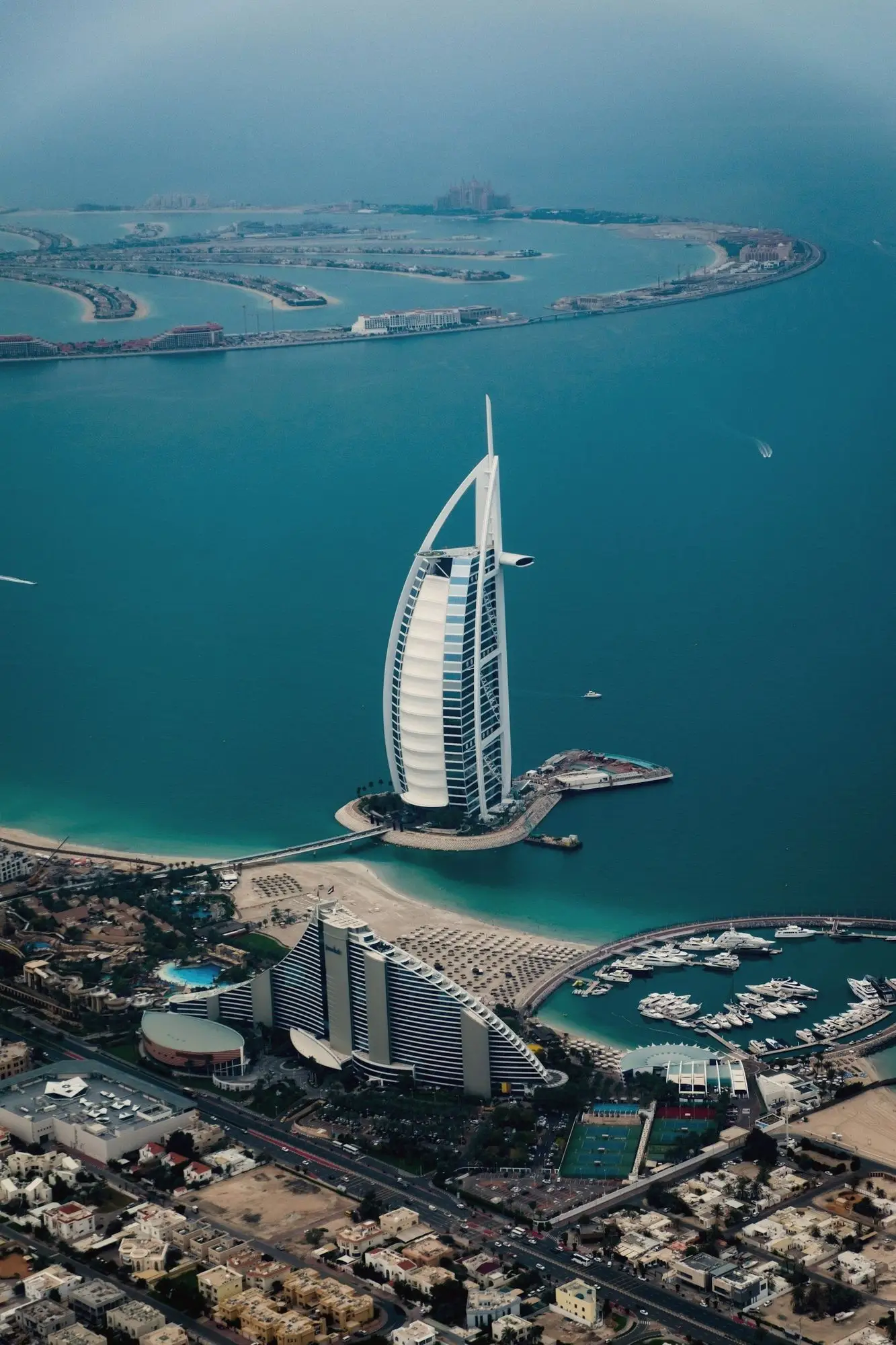 The sail-shaped Burj Al Arab rising from the sea in Dubai